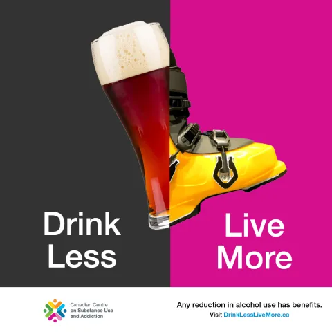 A glass of beer over a black background split with the toe of a yellow downhill ski boot over magenta background, together forming the shape of a full downhill ski boot taking a step forward. 